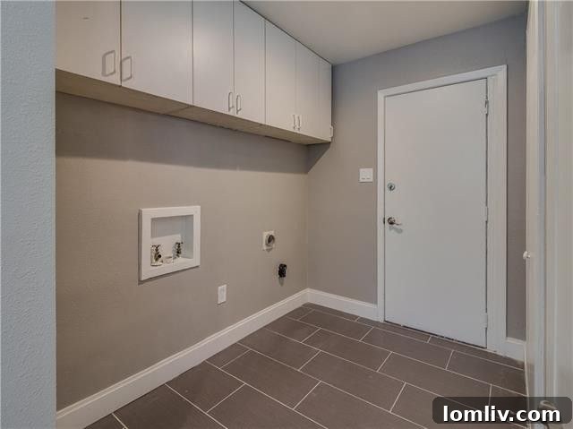 Hallway leading to bedrooms, showing consistent laminate flooring