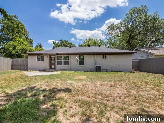 Front living room bathed in natural light, ready for furnishing