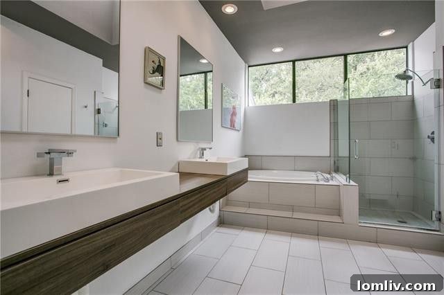 Cozy bedroom featuring a rounded walk-in closet in the Bluffview contemporary home