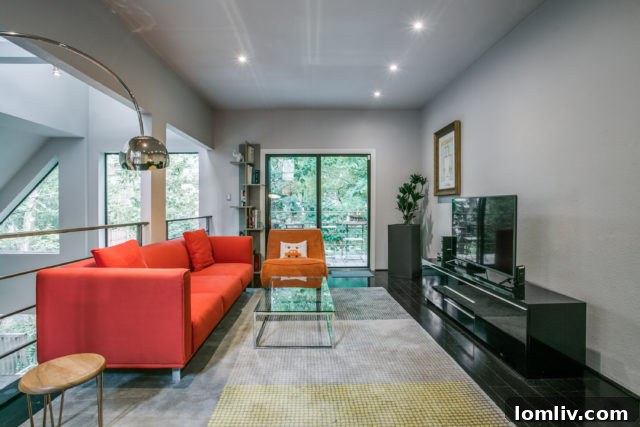 Spacious outdoor deck overlooking the creek and lush trees at 9119 Chapel Valley Road