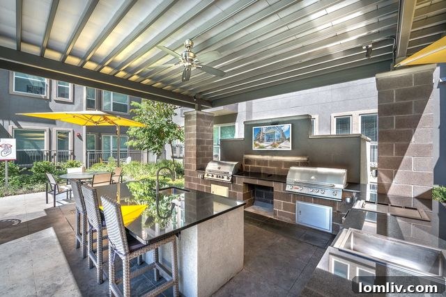 Olympus at Ross's inviting pool plaza with gas grills and fire pits