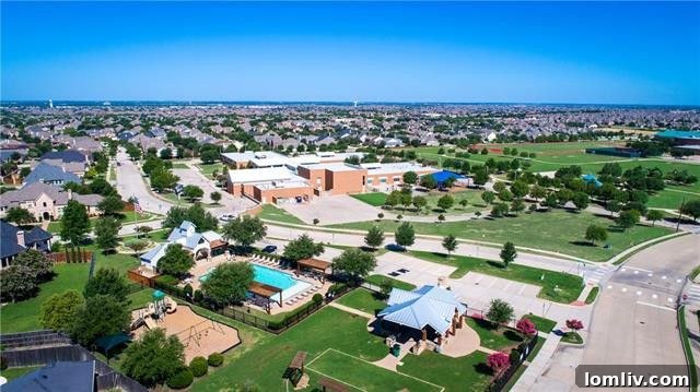 Covered patio with dining space overlooking the pool at 4518 Siena Drive Frisco