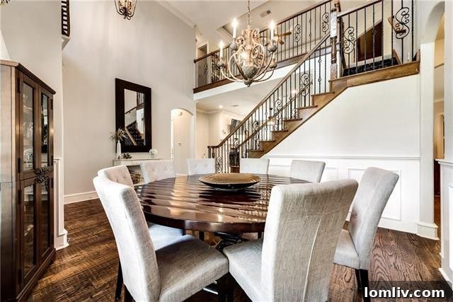 Spacious living room at 4518 Siena Drive Frisco, featuring a gas fireplace with shiplap accent and ample natural light