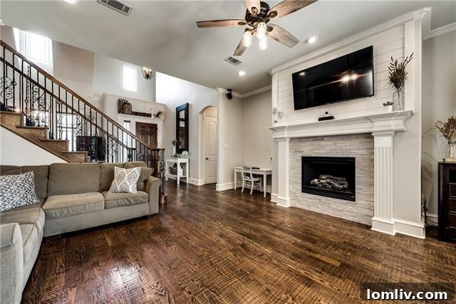 Gourmet kitchen at 4518 Siena Drive Frisco with slab granite countertops, custom cabinets, and stone backsplash