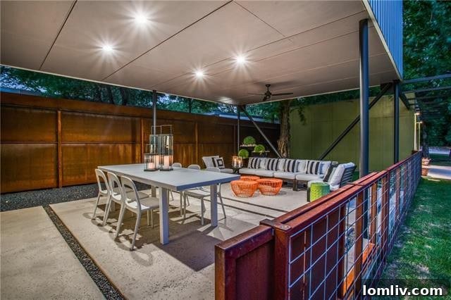 Exterior View of Home with Pond in Foreground