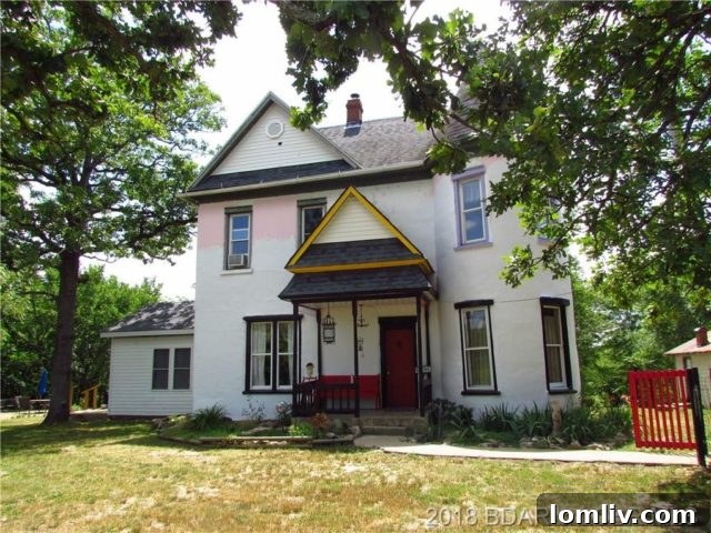 The Graveyard Bed and Breakfast 2 Exterior view of the historic Haunted Castle House in Brumley, Missouri, a famous paranormal destination.