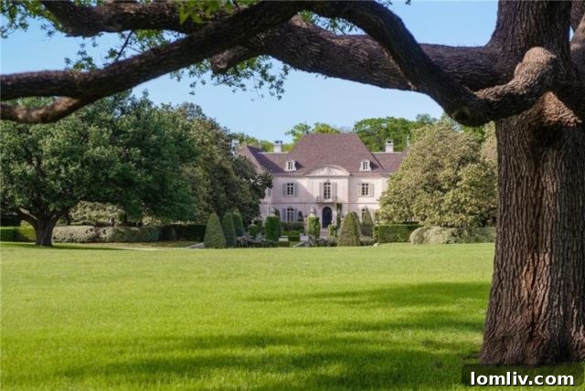 Exquisite tree-lined view of the opulent Crespi Estate at Walnut Place, Dallas
