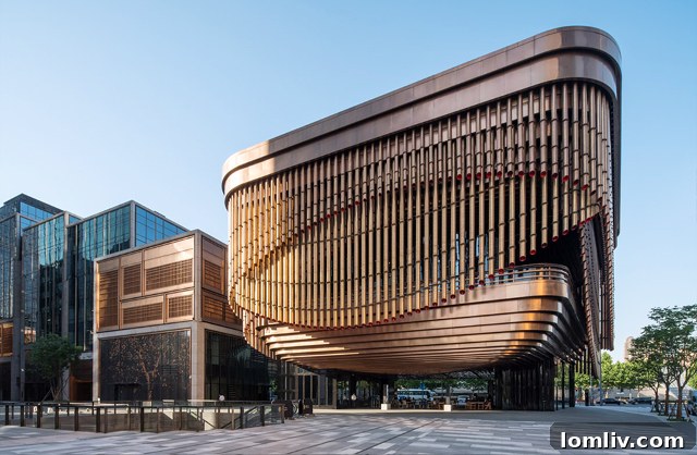 The Bund Financial Center Cultural Center with its moving curtain of stylized bamboo slats partially closed.