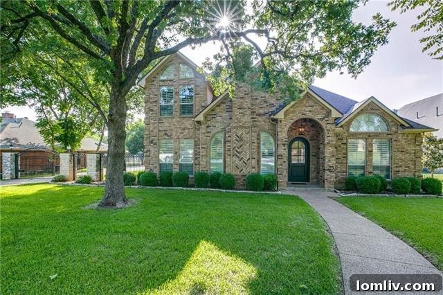 Charming exterior view of a Southlake home with mature landscaping