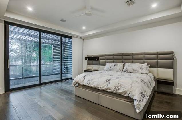 Open living area looking out to the patio through large folding glass doors