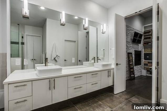 Luxurious master bathroom with freestanding tub and walk-in shower