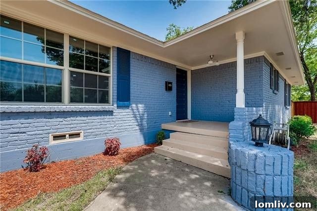 Stunning fully renovated Wynnewood North home exterior with lush landscaping