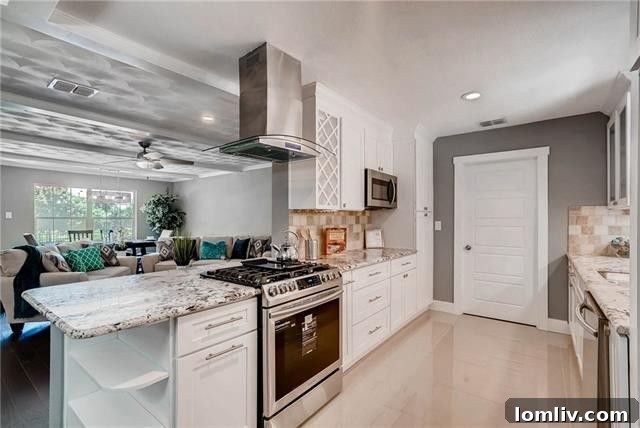 Master bathroom with dual sinks set in granite countertops and contemporary fixtures