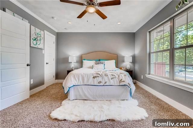 Full secondary bathroom with contemporary fixtures and ample lighting