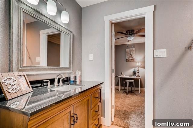 Detail of the backyard privacy fence and well-maintained landscaping