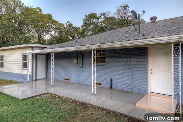 Inviting pathway leading to the contemporary entrance of the home
