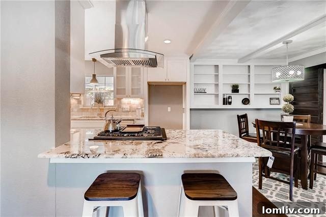 Second living area with a built-in bench and access to a half bath