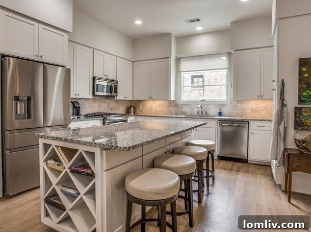 Arch Adams Townhouse: Modern Elegance, Prime Address 8 Dining area flowing into the modern living space