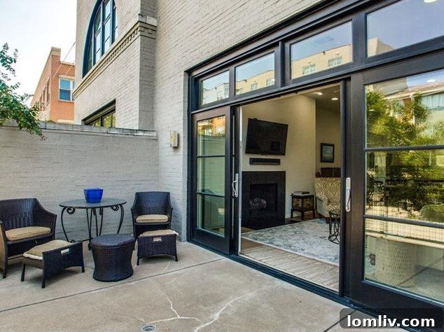 Arch Adams Townhouse: Modern Elegance, Prime Address 9 Gourmet kitchen with stainless steel appliances and ample granite countertops