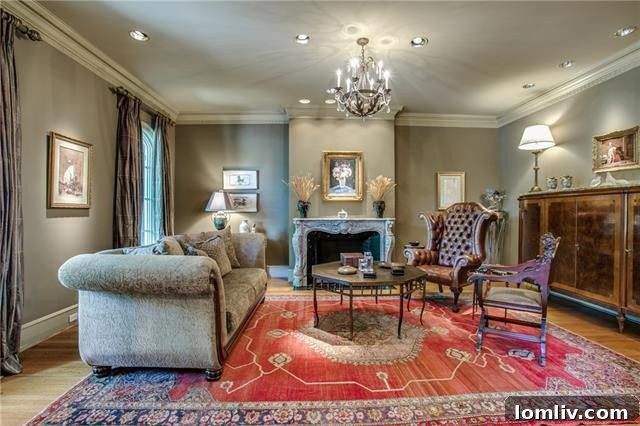 Bluffview's Private 2-Acre Urban Sanctuary 11 Formal living room with an exquisitely carved fireplace, one of three in the luxurious Bluffview estate