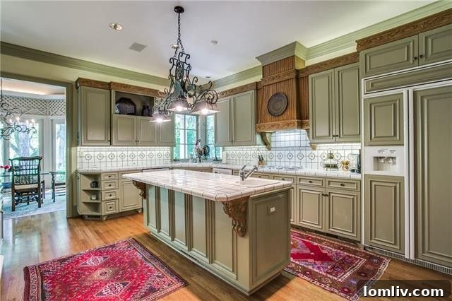 Bluffview's Private 2-Acre Urban Sanctuary 16 Luxurious French country kitchen with extensive custom cabinetry, a chef's dream in Dallas