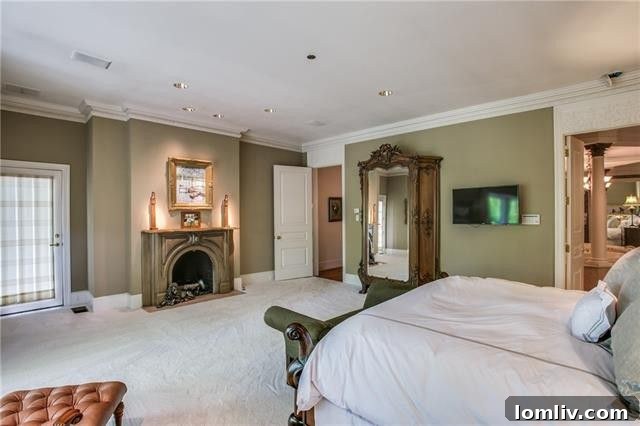 Bluffview's Private 2-Acre Urban Sanctuary 19 Cozy fireplace in the luxurious master bedroom, providing warmth and ambiance