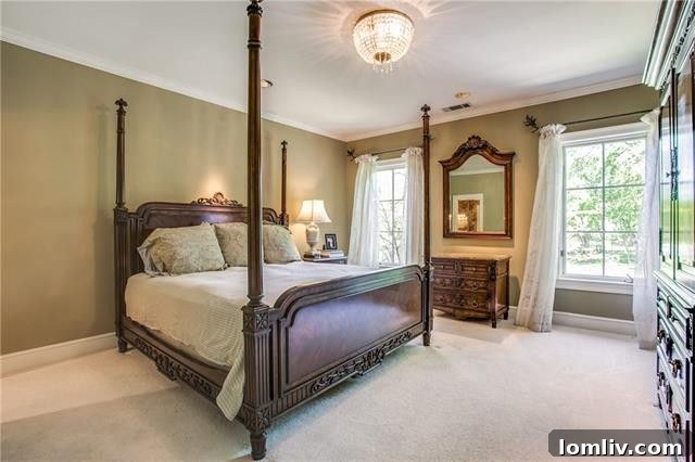 Bluffview's Private 2-Acre Urban Sanctuary 26 Elegant secondary bedroom featuring stylish decor and spacious accommodations