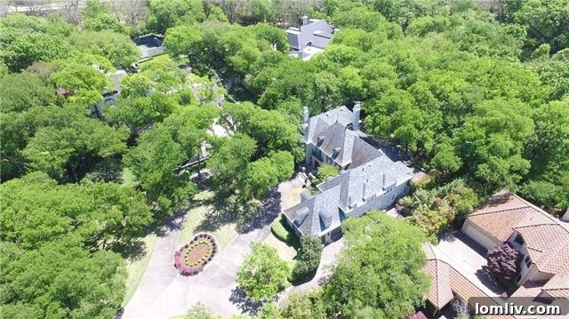 Bluffview's Private 2-Acre Urban Sanctuary 9 Aerial view showcasing the expansive private, gated Bluffview estate with lush acreage and ultimate privacy