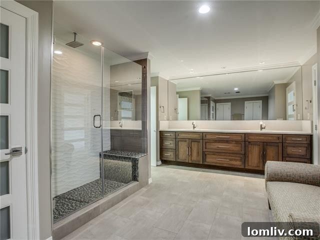 Luxurious Master Bathroom with Custom Cabinetry and Dual Sinks