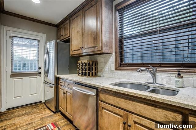 Stylish Kitchen with Granite Countertops and Custom Cabinetry