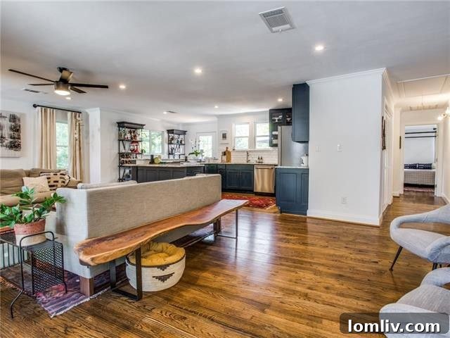 Elegant Open Concept Living Area with Fireplace