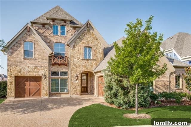 The stunning stone and brick facade of 3412 Dunbar Court, The Colony, Texas, offering exceptional curb appeal.
