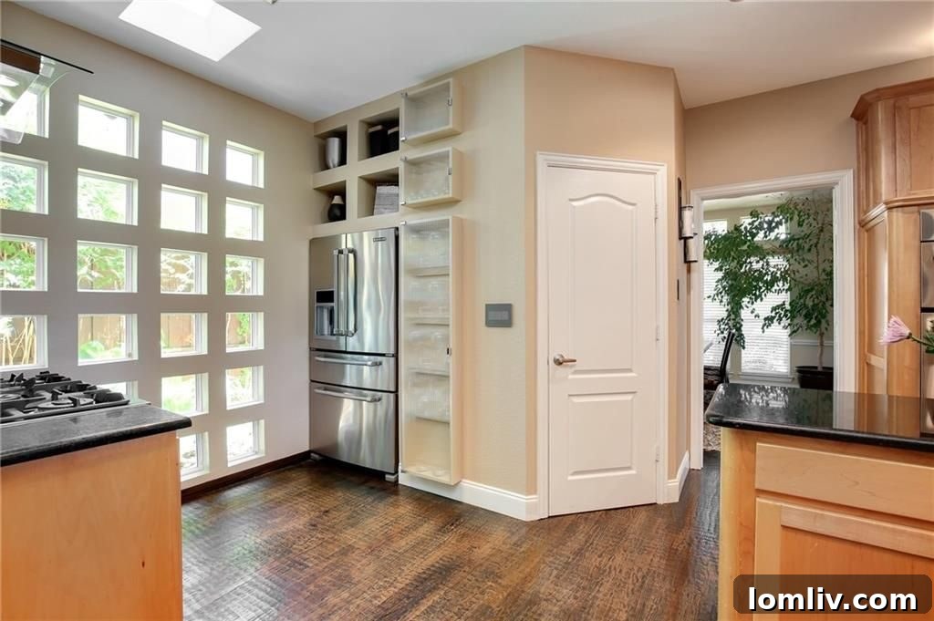 Chef's Kitchen with Multiple Ovens and Wine Cooler