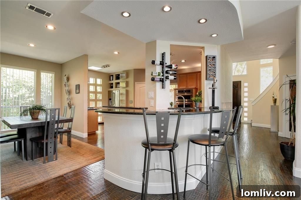 Breakfast Nook and Curved Bar in Kitchen