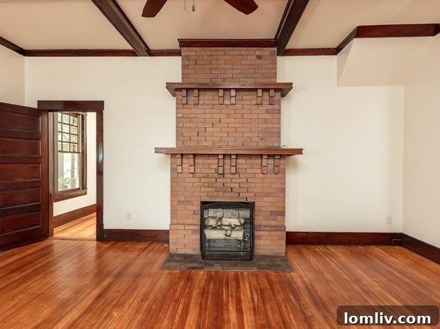 Hemphill Heights Classic: Craftsman Home with Untapped Potential on Travis Avenue 4 View of the meticulously restored wood trim and shining hardwood floors in the main living area