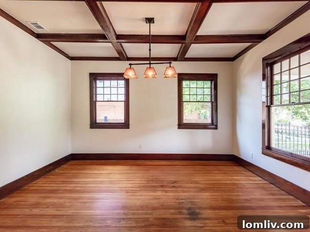 Hemphill Heights Classic: Craftsman Home with Untapped Potential on Travis Avenue 6 Detailed shot of refinished hardwood floors and architectural elements, reflecting light