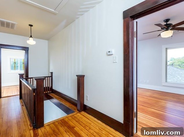 Hemphill Heights Classic: Craftsman Home with Untapped Potential on Travis Avenue 9 Close-up of the professional-grade stainless steel refrigerator in the updated kitchen