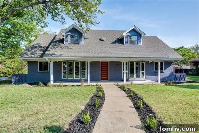 Lochwood's Blue Gem: Prime Dixon Branch Living for $530,000 2 The charming bright blue exterior of 10611 Wyatt Street, a renovated home in Dallas's Lochwood neighborhood, listed by Lone Star Realty