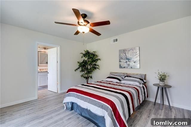 One of the generously sized bedrooms, offering a blank canvas for personalization.