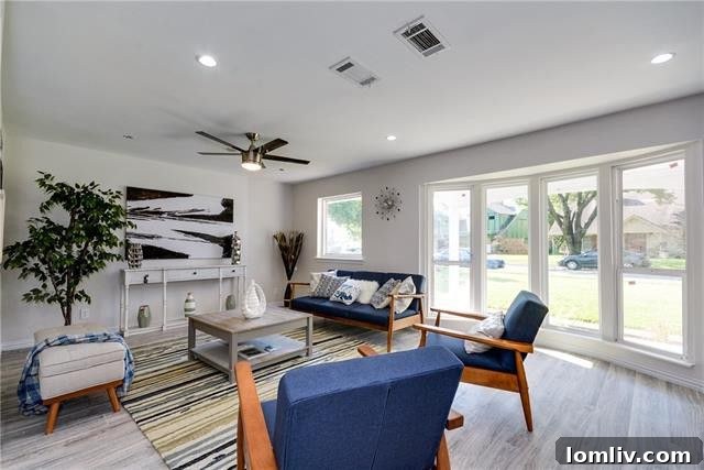 Welcoming facade of the 1964 home at 10611 Wyatt Street, featuring a vibrant red door and well-maintained landscaping.