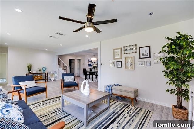 The spacious and bright living area inside 10611 Wyatt Street, highlighting the open floor plan perfect for entertaining.