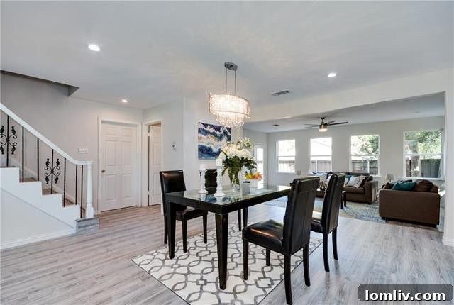 The second inviting living space, perfect for family gatherings or quiet relaxation.