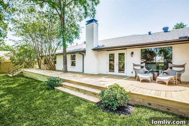 Beautifully landscaped backyard with new wood deck, 7229 Midbury Dr Dallas