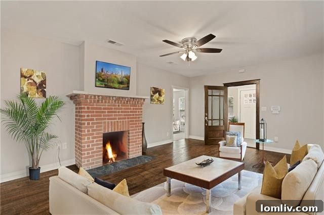 Elegant living room with hand-scraped hardwood floors, 720 Elsbeth St