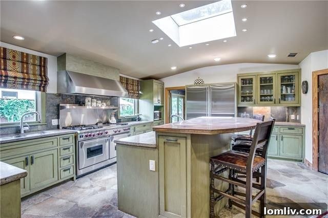 Luxurious living space featuring a fireplace and wet bar, Forest Hills home