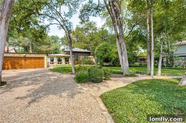 Serene screened-in porch overlooking lush backyard, ideal for relaxation