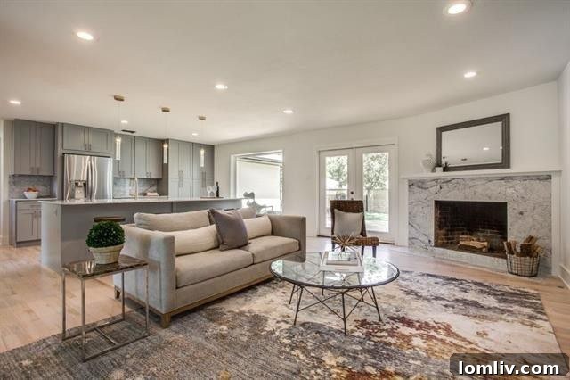 Bright and airy open-concept living area with hardwood floors, 7229 Midbury Dr