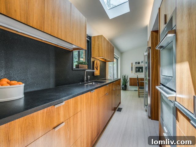 Open concept kitchen and dining area with exposed brick