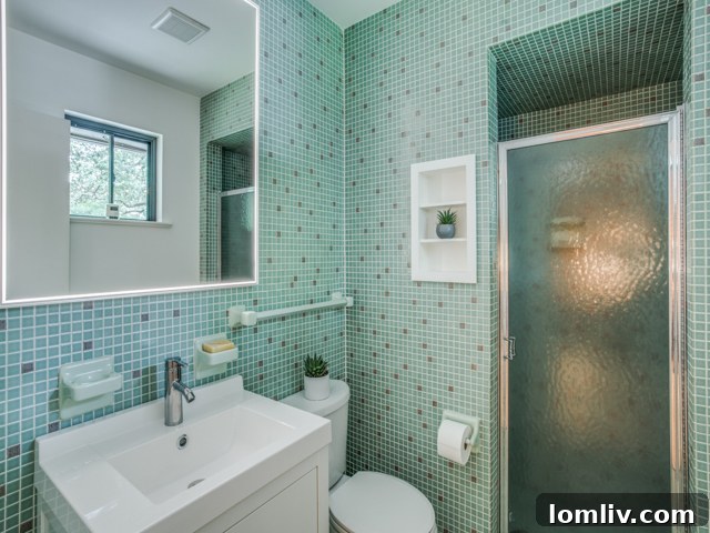 Preserved original green mosaic tile in the ensuite bathroom