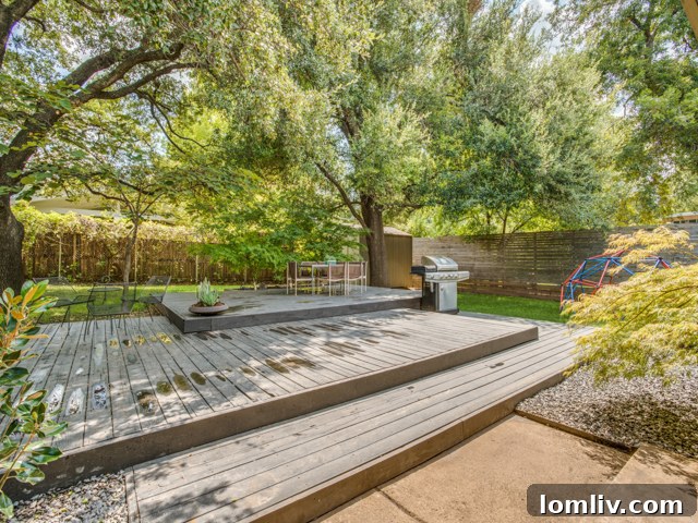 Multi-level wood deck with integrated planters in the backyard